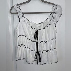 Elegant White Ruffled Blouse with Black Trim